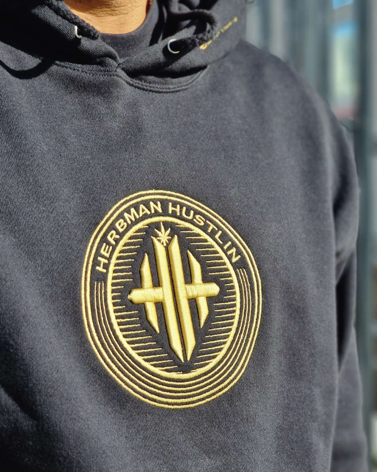 Herbman Hustlin Gold Emblem Heavyweight Monogram Hoodie - Black/Gold
