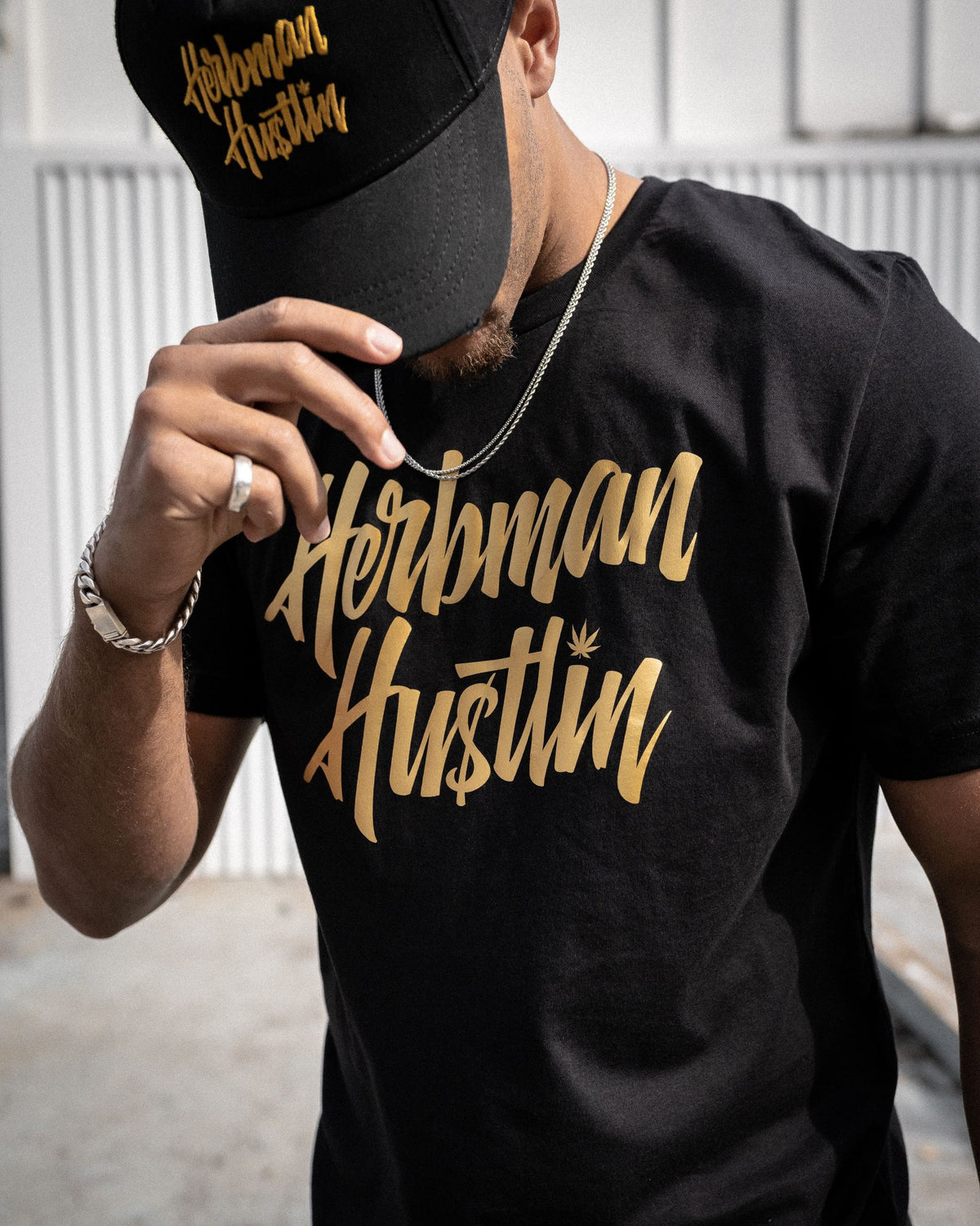 Herbman Hustlin Script Front Print Tee - Black/Gold